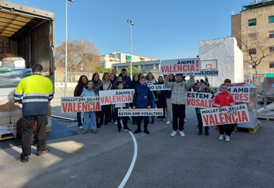 acte recollida material escolar per Valencia.