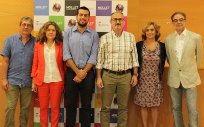 Relleu dels dos inspectors d'ensenyament de Mollet .