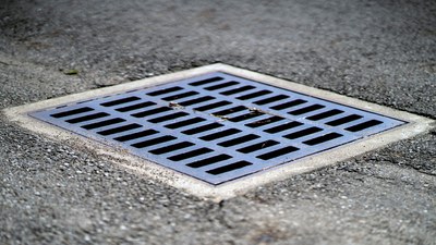 Tapa de alcantarillado.